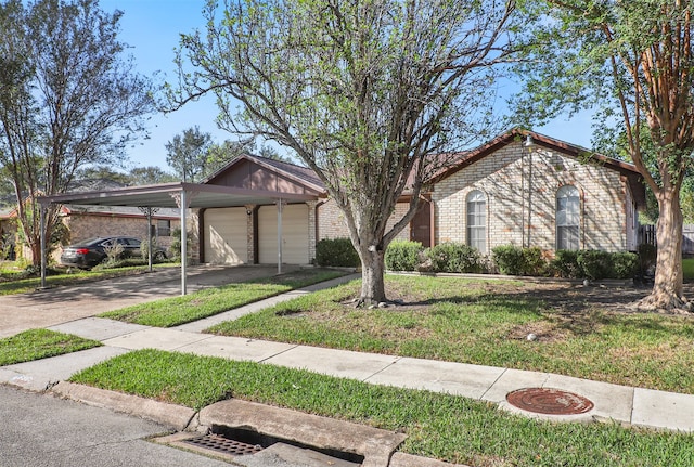 view of front of home featuring a front lawn, a garage, and a carport