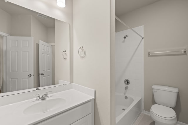 full bathroom featuring vanity, shower / bathtub combination, and toilet