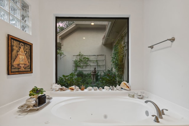 bathroom featuring a washtub