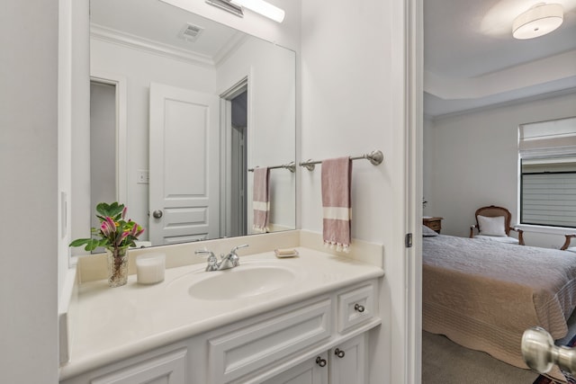 bathroom featuring vanity and crown molding