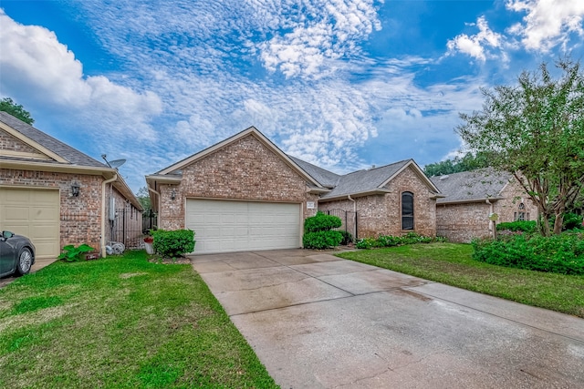 single story home with a front lawn and a garage