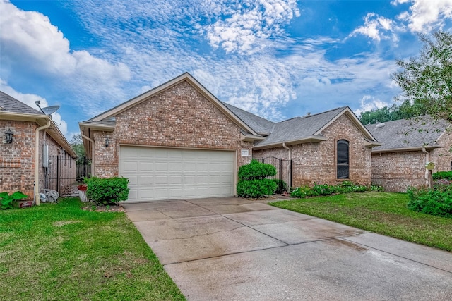 3110 Meadow Oak Dr, Houston, TX 77068 - single story home featuring brick siding, a gate, driveway, and an attached garage