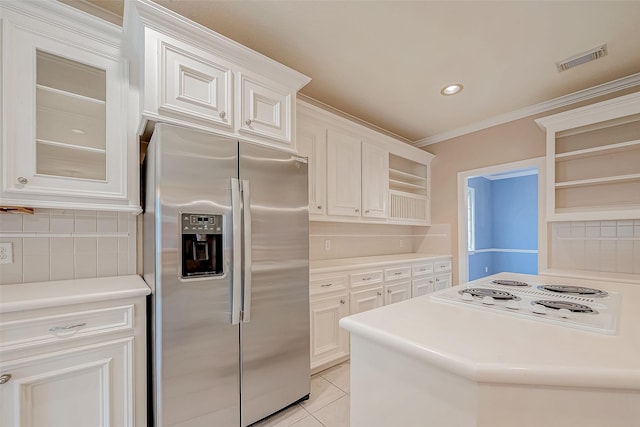 3110 Meadow Oak Dr, Houston, TX 77068 - kitchen featuring stainless steel fridge, open shelves, white electric stovetop, ornamental molding, and backsplash
