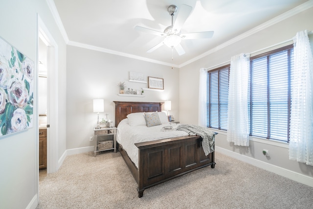 carpeted bedroom with connected bathroom, ceiling fan, and ornamental molding