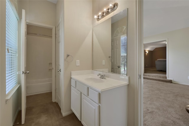 19815 Stanton Lake Dr, Cypress, TX 77433 - bathroom featuring vanity, baseboards, and  shower combination
