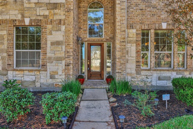 19815 Stanton Lake Dr, Cypress, TX 77433 - doorway to property with stone siding and brick siding