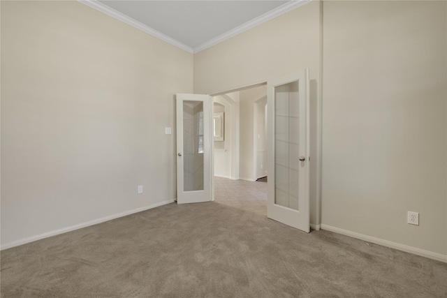 19815 Stanton Lake Dr, Cypress, TX 77433 - carpeted spare room featuring french doors, crown molding, and baseboards