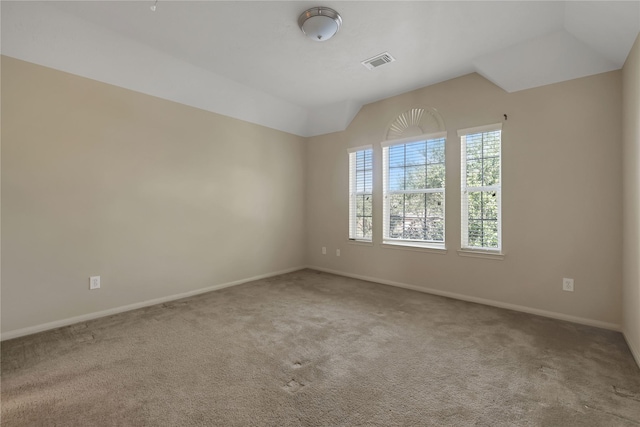 19815 Stanton Lake Dr, Cypress, TX 77433 - unfurnished room featuring carpet floors, baseboards, and vaulted ceiling