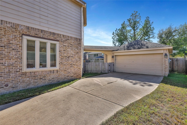 19815 Stanton Lake Dr, Cypress, TX 77433 - view of property exterior featuring brick siding, driveway, and a garage