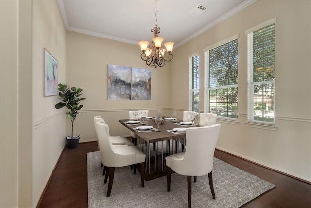 19815 Stanton Lake Dr, Cypress, TX 77433 - dining room with a chandelier, ornamental molding, wood finished floors, and baseboards