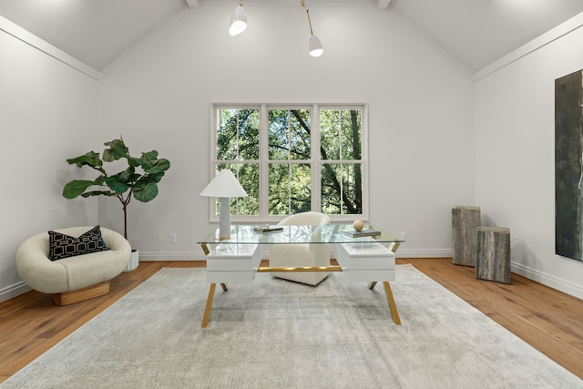 office area featuring beamed ceiling, hardwood / wood-style floors, and high vaulted ceiling