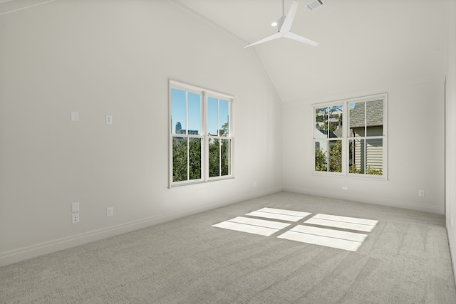 unfurnished room with light carpet, ceiling fan, and lofted ceiling