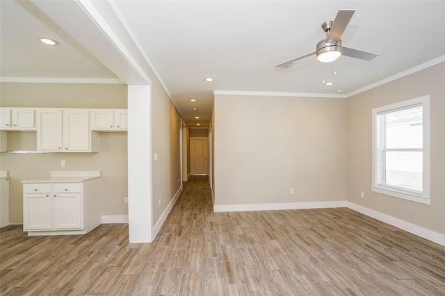 6609 Greenhurst St, Houston, TX 77091 - unfurnished living room with light wood finished floors, crown molding, baseboards, recessed lighting, and a ceiling fan