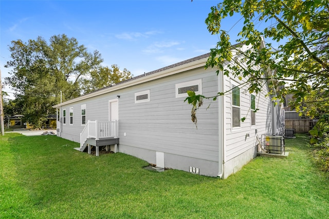 view of property exterior featuring a yard