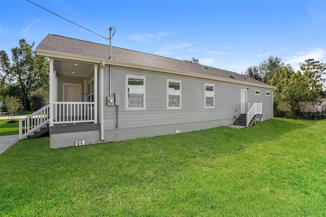 6609 Greenhurst St, Houston, TX 77091 - rear view of property featuring a lawn
