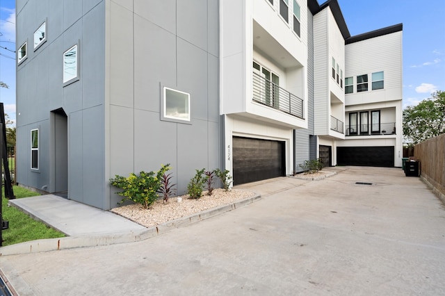 view of side of home with a garage