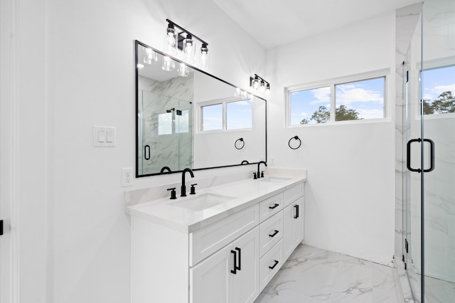 bathroom with vanity and an enclosed shower