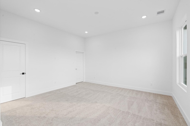 4124 Bucks St, Houston, TX 77020 - spare room featuring light colored carpet and recessed lighting