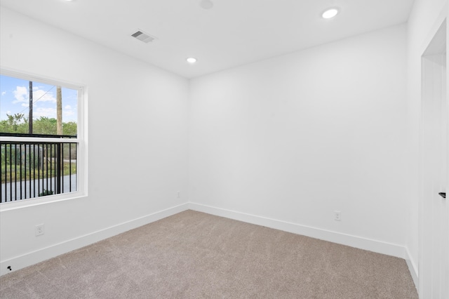 view of carpeted spare room