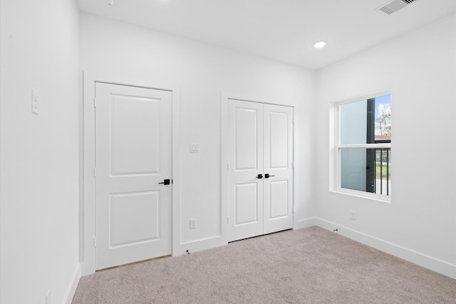 4124 Bucks St, Houston, TX 77020 - unfurnished bedroom featuring carpet, recessed lighting, and a closet
