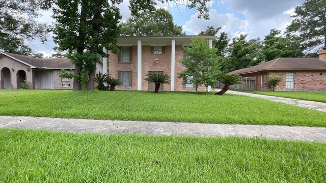 view of front of home with a front yard