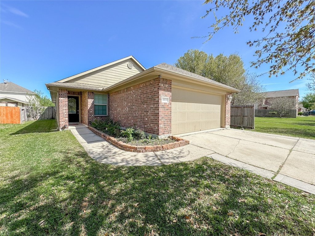 ranch-style house with a front lawn and a garage