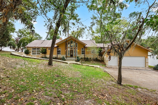 view of front of home with a garage