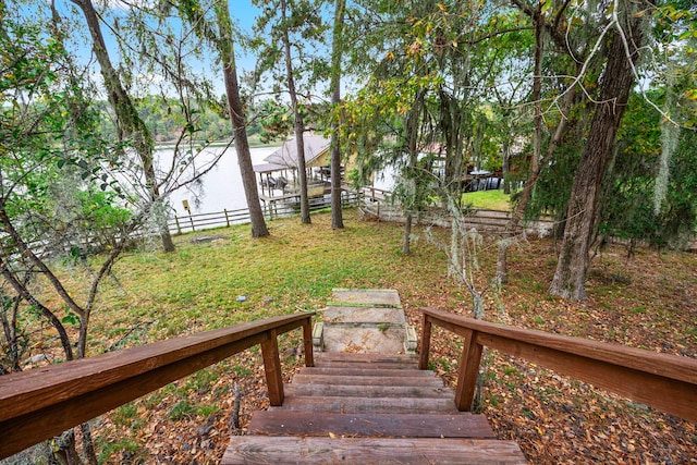 view of yard with a water view