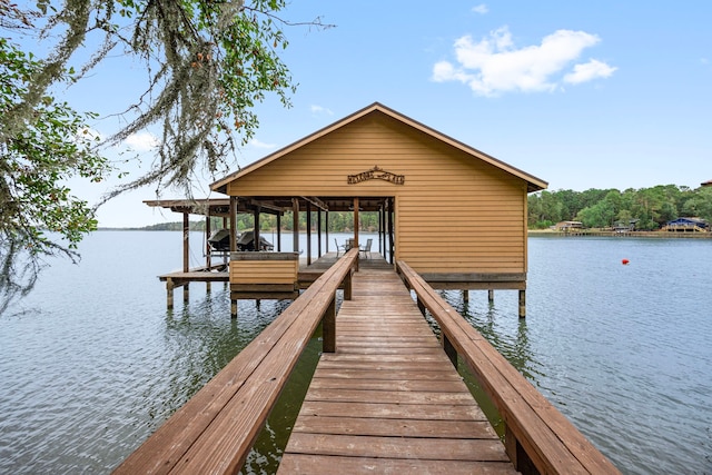 dock area featuring a water view