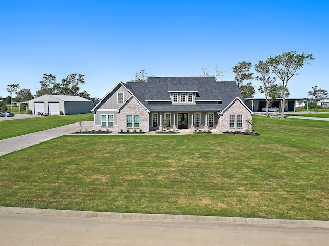 view of front of property with a front yard and a porch