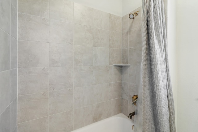 bathroom featuring shower / bath combination with curtain