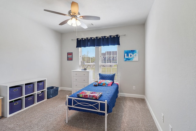 carpeted bedroom featuring ceiling fan