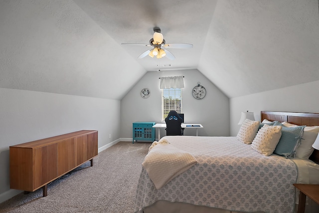 bedroom with light colored carpet, vaulted ceiling, and ceiling fan