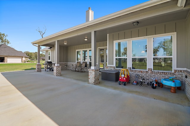 view of patio / terrace featuring grilling area and covered porch