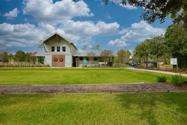 view of home's community featuring a yard