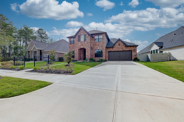 view of front of property with a front lawn and a garage