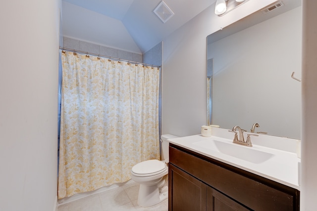 bathroom with vanity, tile patterned floors, vaulted ceiling, toilet, and curtained shower