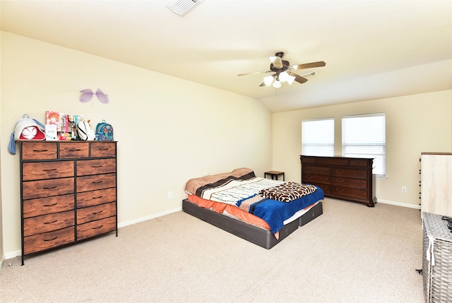 carpeted bedroom featuring ceiling fan and lofted ceiling