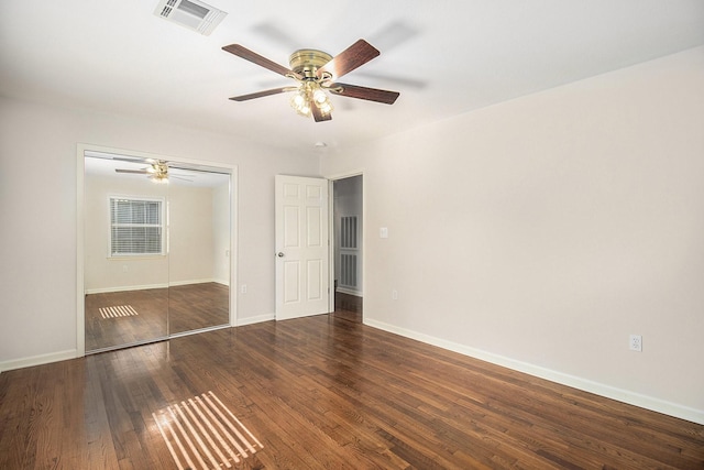 4837 Briarbend Dr, Houston, TX 77035 - unfurnished bedroom featuring ceiling fan, a closet, and dark wood-type flooring