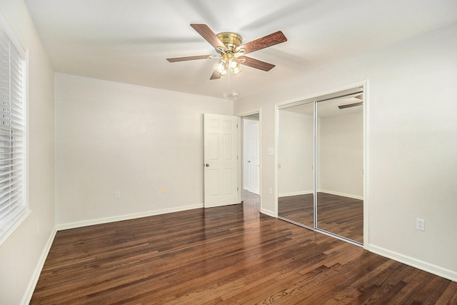 4837 Briarbend Dr, Houston, TX 77035 - unfurnished bedroom with ceiling fan, a closet, and dark wood-type flooring