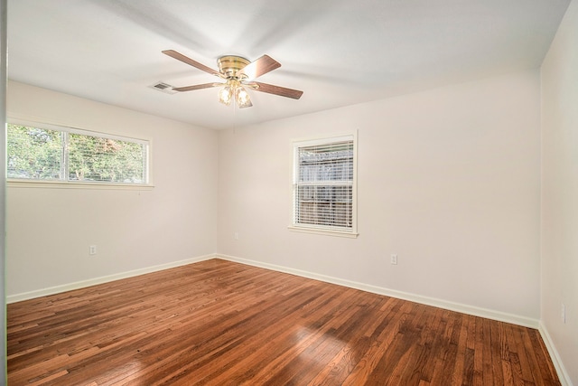 empty room with wood-type flooring and ceiling fan