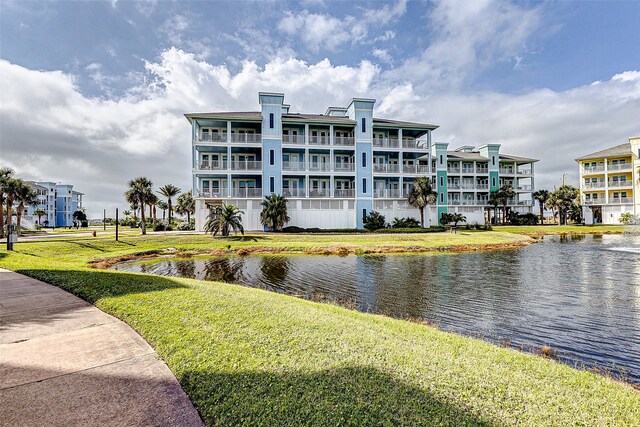 view of building exterior with a water view