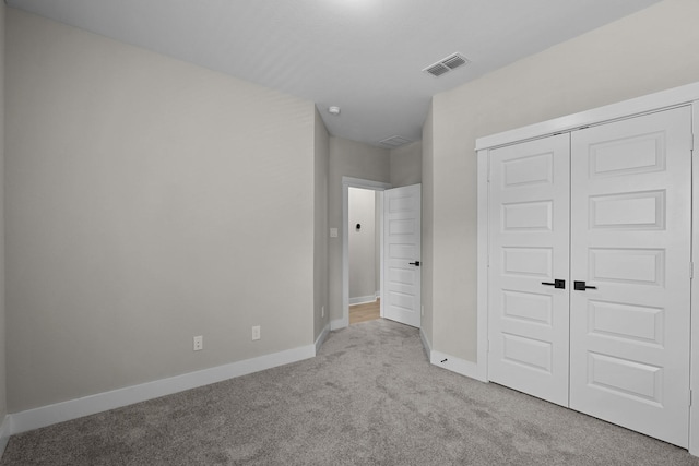16022 Mason Run Dr, Houston, TX 77079 - unfurnished bedroom with carpet flooring, baseboards, a closet, and visible vents