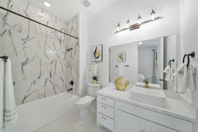 full bathroom with tile patterned floors, vanity, toilet, and shower / bathtub combination with curtain