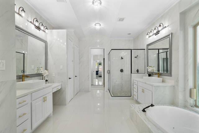 bathroom featuring separate shower and tub, vanity, tile walls, and ornamental molding