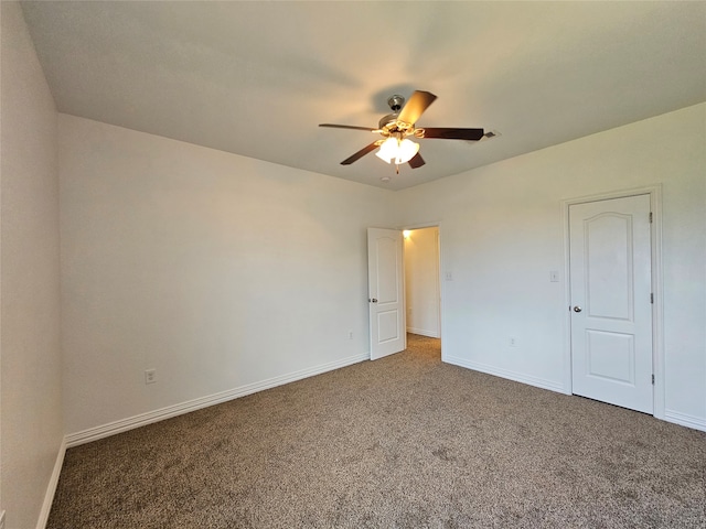 unfurnished bedroom with ceiling fan and carpet floors