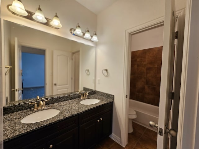 full bathroom featuring tile patterned flooring, vanity, toilet, and bathtub / shower combination