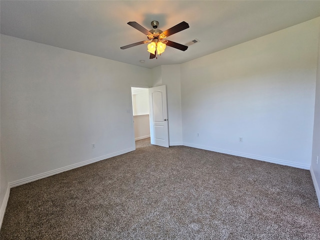 carpeted empty room with ceiling fan