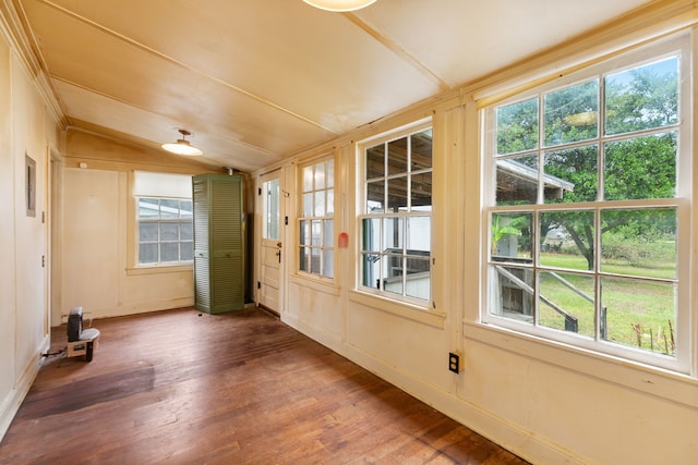 unfurnished sunroom with lofted ceiling