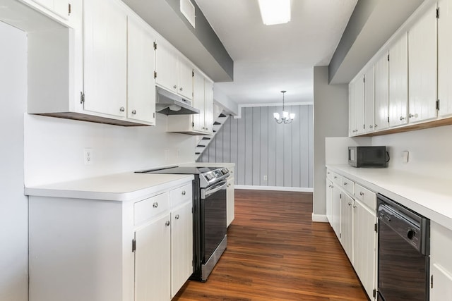 kitchen featuring dark hardwood / wood-style flooring, stainless steel appliances, white cabinets, a chandelier, and hanging light fixtures